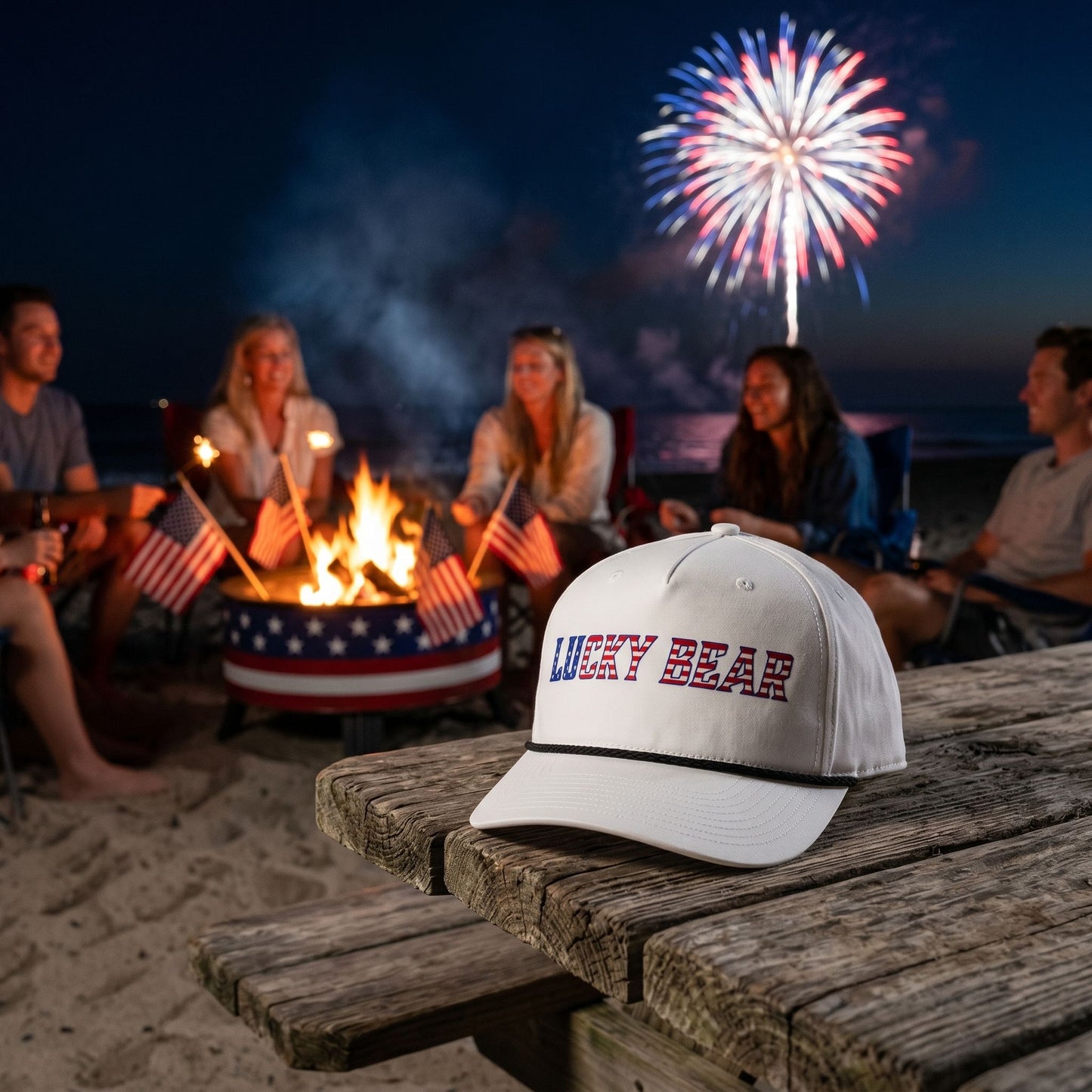 Small-sized American Rope Cap with structured crown and rope brim at a beach bonfire scene during sunset with fireworks and silhouetted people.
