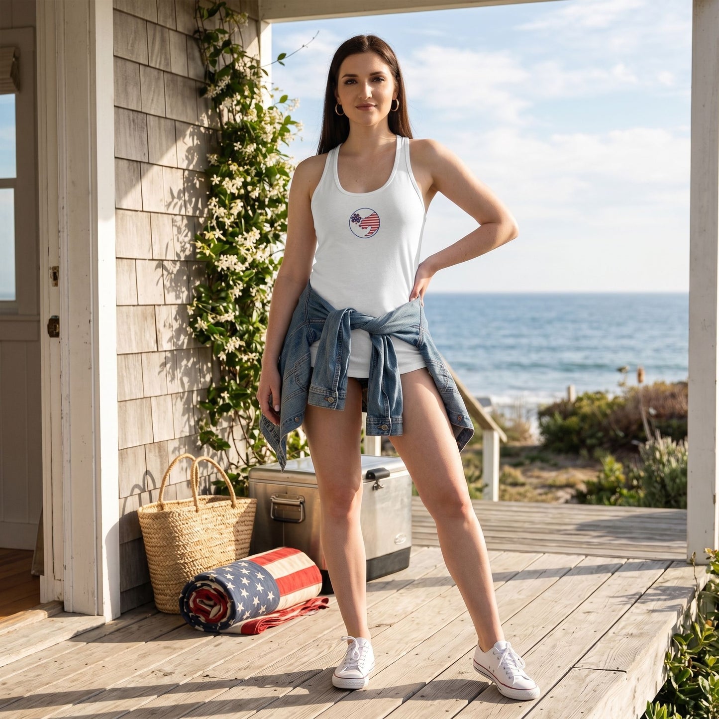 Fitted women's racerback tank top with patriotic logo displayed on a minimalistic set, emphasizing fabric texture and athletic fit.