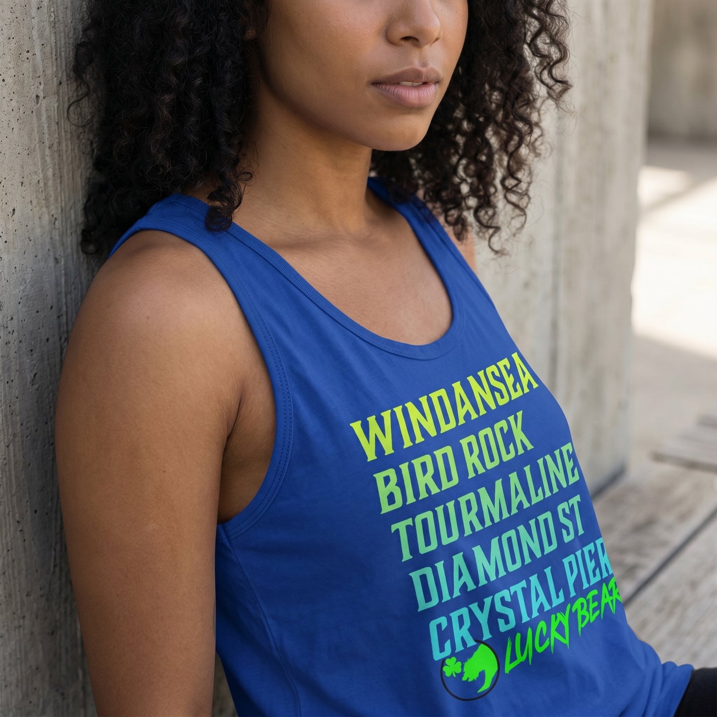 Close-up of Lucky Breaks Tank Top on a model's shoulder highlighting fabric softness and weave details in neutral lighting.