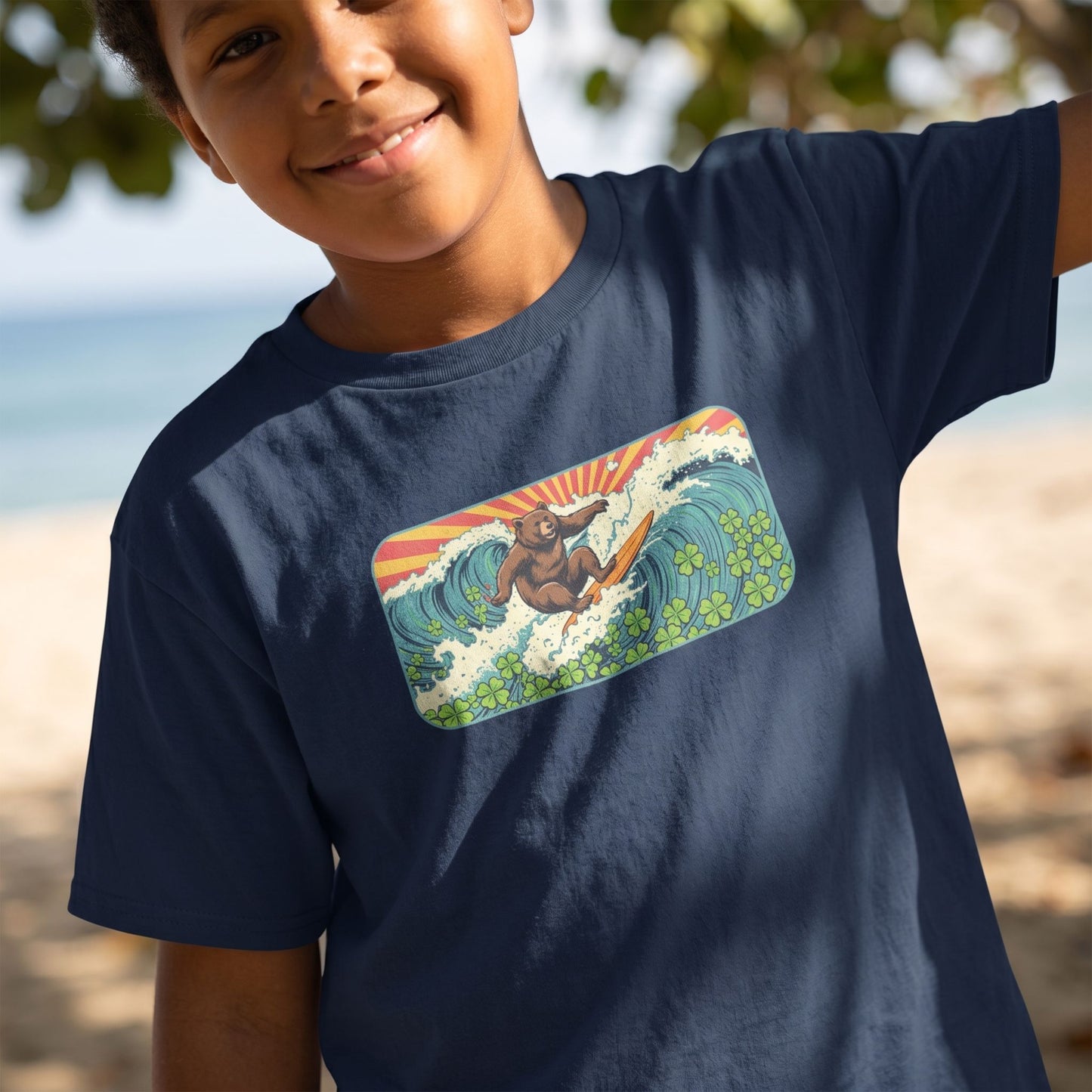 Close-up of kid wearing Surf Club Retro Bear Youth Tee highlighting fabric texture and print detail.