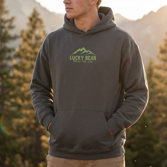 Close-up of Sierra Summit unisex hoodie fabric texture during golden hour outdoors, emphasizing its softness and natural sheen.