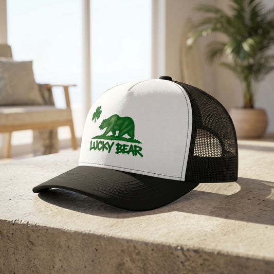 Artistic side profile of Lucky Republic Trucker Cap on textured indoor surface near window, focusing on stitching and material.