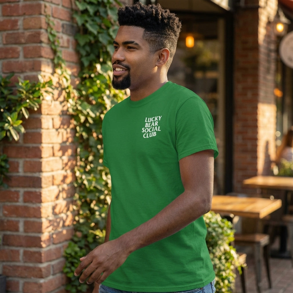 Side profile of a model wearing Lucky Bear Social Club T-shirt, emphasizing fit, fabric texture, and logo detail.