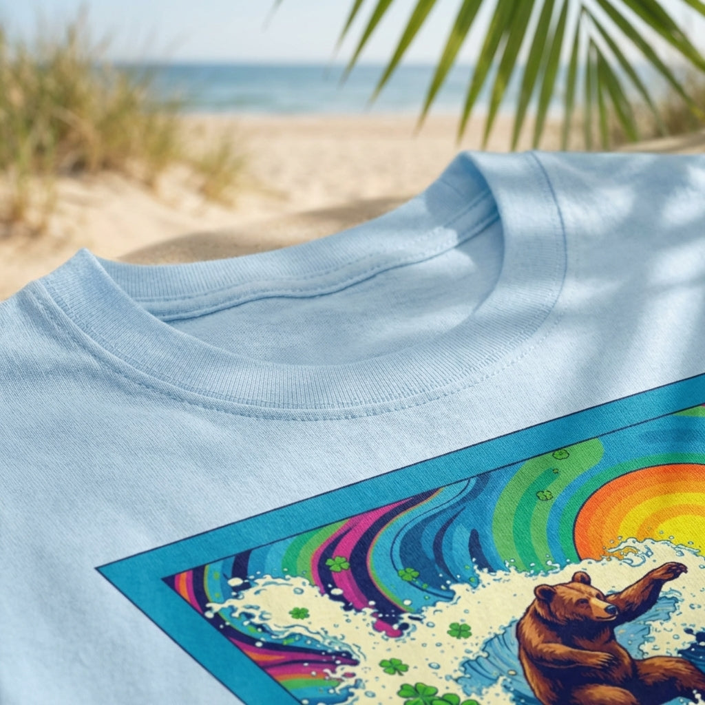 Close-up of Surf Club Riding Waves Tee showing fabric texture, stitching, in beach setting with natural sunlight.